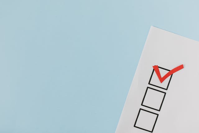 red-checkmark-in-a-box-on-a-piece-of-paper